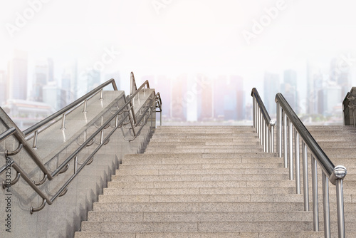 Fototapeta Staircase Leading Towards Buildings In City Against Sky
