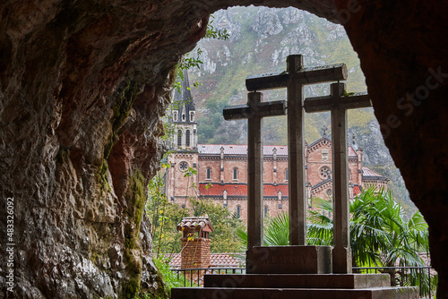 Picturesque red stone basilica and mountains in Covadonga. Cangas, Asturias