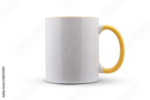 white mug with a yellow handle isolated on white background