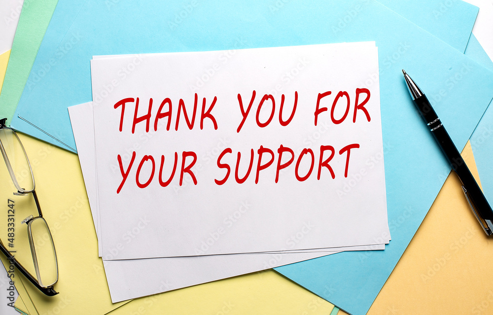 THANK YOU FOR YOUR SUPPORT text on paper on the colorful paper background THANK YOU FOR YOUR SUPPORT text on paper on the colorful paper background