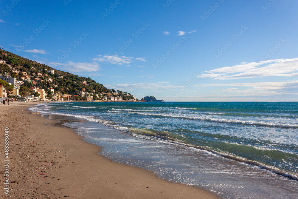 the beach of alassio, in the riviera di ponente coast, in liguria, on a clear November morning the beach of alassio, in the riviera di ponente coast, in liguria, on a clear November morning