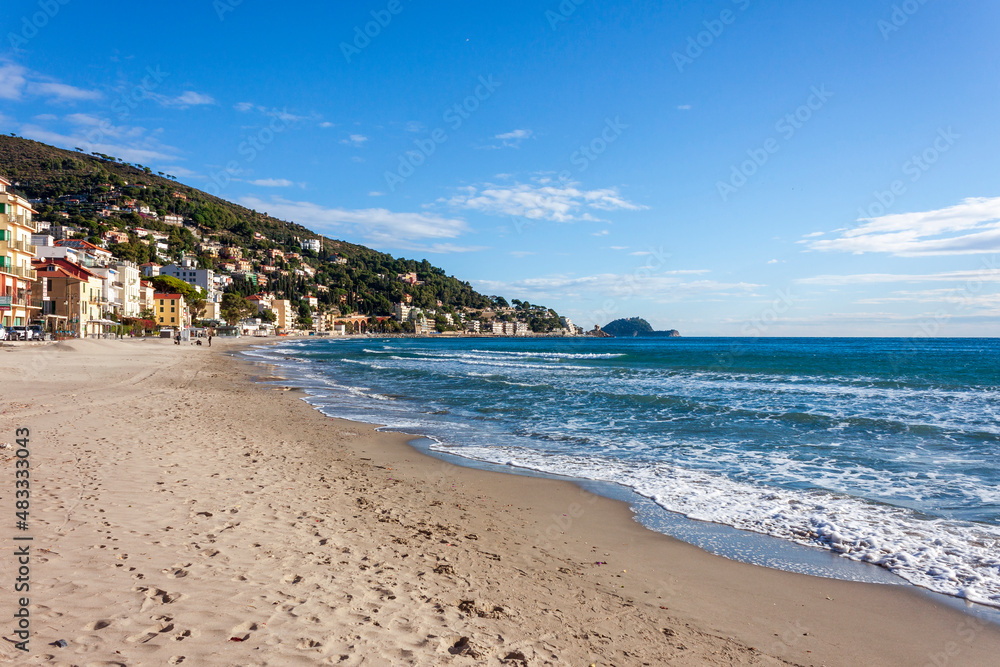 the beach of alassio, in the riviera di ponente coast, in liguria, on a clear November morning the beach of alassio, in the riviera di ponente coast, in liguria, on a clear November morning