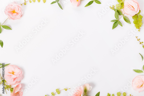 Festive flower composition on white background. Overhead view