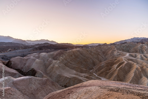 Scenery while sunrise in the Death Valley with rocks and desert in the west of the U.S.