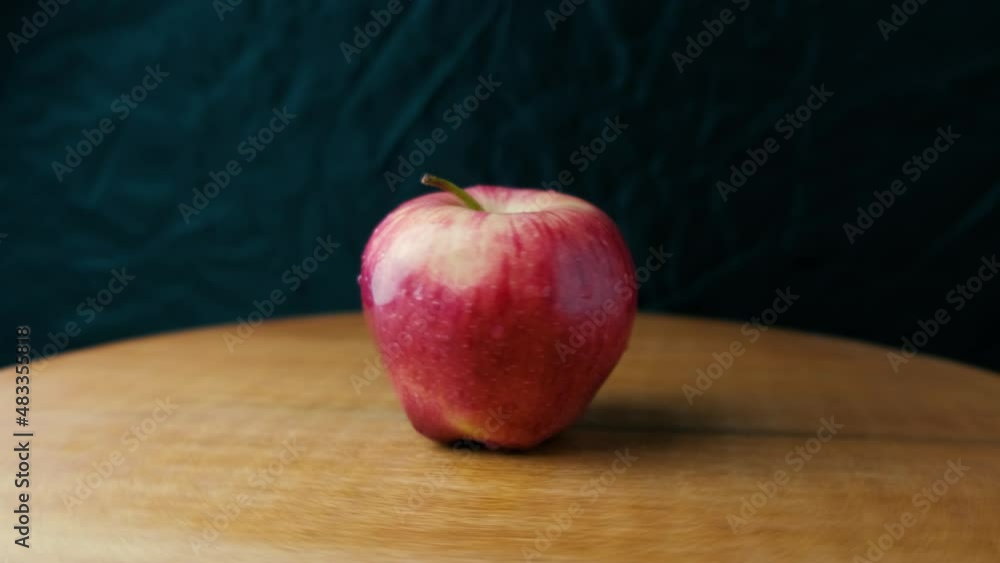 Rotating Red Apple on black background Rotating Red Apple on black background