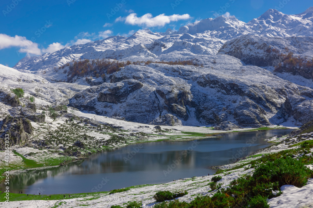 Lakes of Covadonga in Asturias with snowy mountains