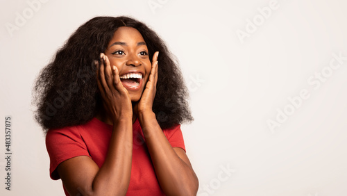 Amazing Offer. Portrait Of Surprised Black Lady Looking Away With Excitement
