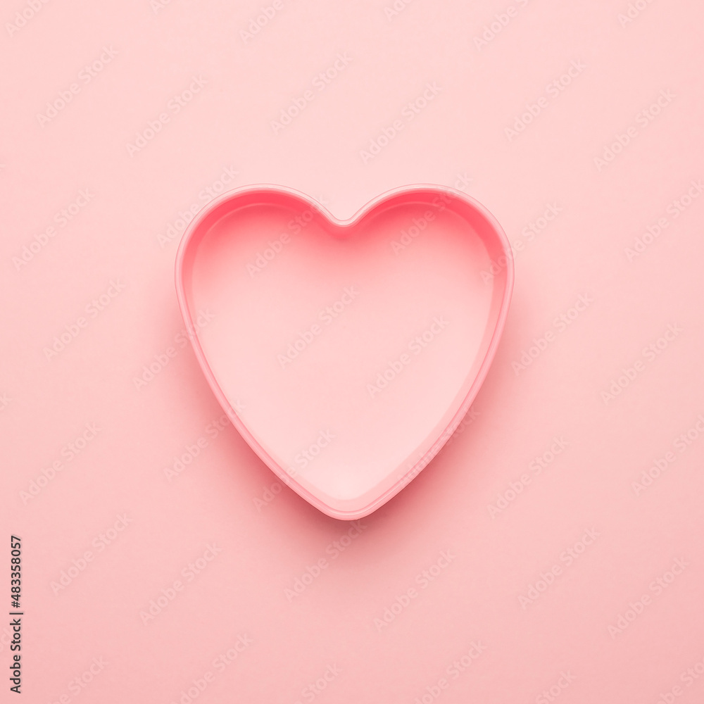 A heart on a pink background. Valentine's Day Concept.