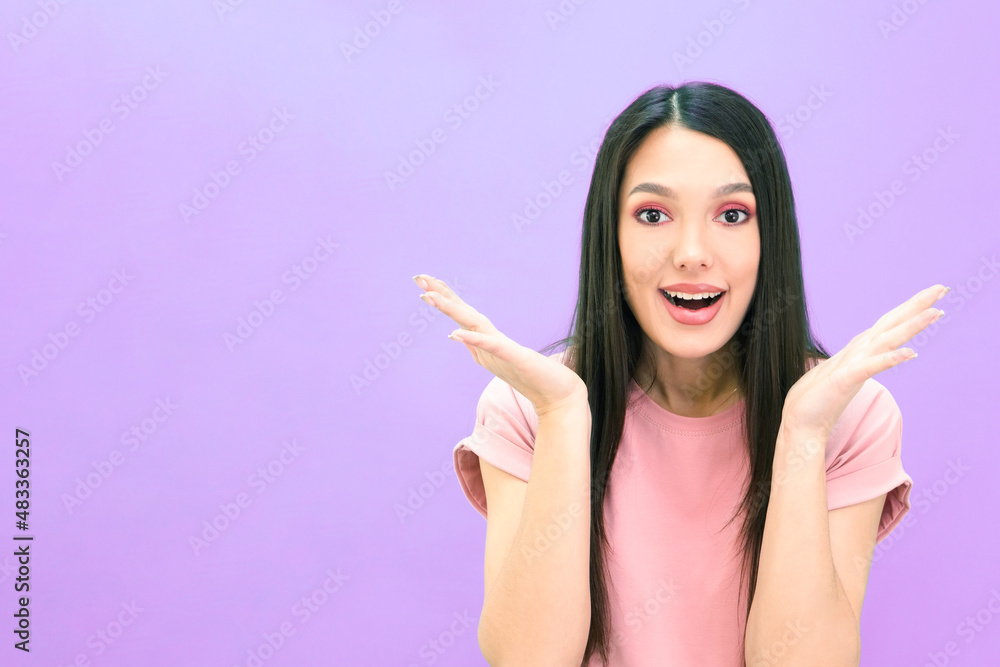 Beautiful young brunette woman is surprised. Expression of surprise Beautiful young brunette woman is surprised. Expression of surprise