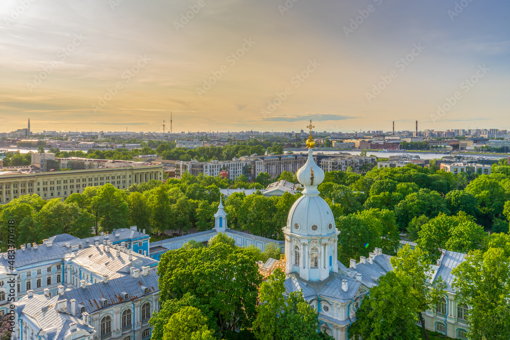 View from bell tower of Smolny Cathedral to historic centre of Saint-Petersburg in sunny summer evening. Panoramic cityscape of St. Petersburg, Russia. Travel blog concept. UNESCO world heritage site