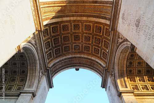 View of the landmarc Arc de Triomphe monument on the Champs-Elysees in Paris, France photo