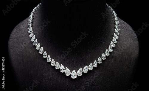 Expensive diamond necklace, on the jewelry stand.