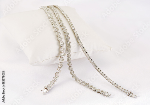 Diamond jewelry. Diamond bracelets on white background