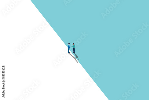 Business negotiation, deal making or acquisition, merger vector concept. Two men shaking hands. Minimal design. Eps10 illustration.eps