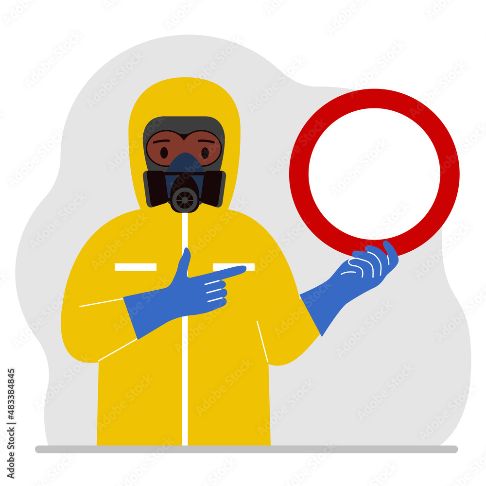 A man in a yellow radiation protective suit and a helmet with a respirator, chemical or biological safety uniform. Holds a prohibition sign. A man in a yellow radiation protective suit and a helmet with a respirator, chemical or biological safety uniform. Holds a prohibition sign.