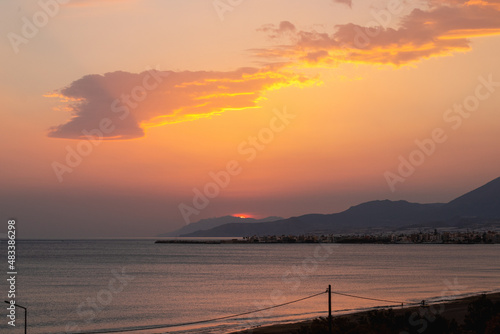 epic sunset by the beach on the island of crete