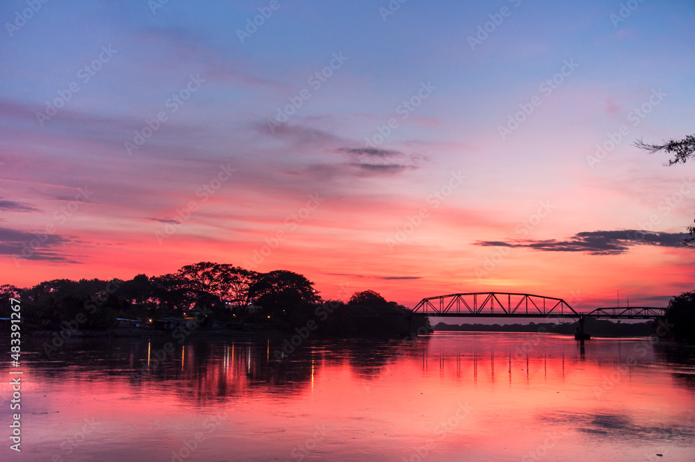 Landscape with beautiful sunset overlooking the river in Los Llanos, Colombia.