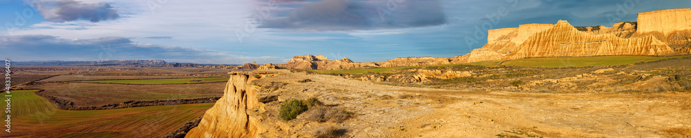 Cliff formations in semi desert area under blue sky Cliff formations in semi desert area under blue sky