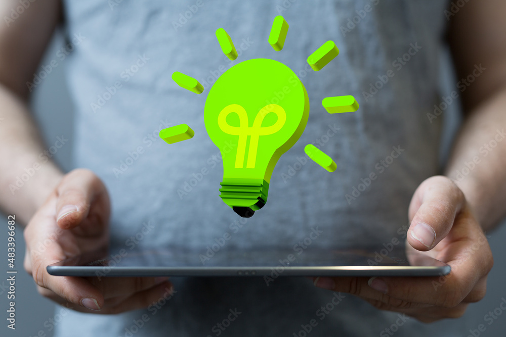 hand holding eco light bulb energy concept hand holding eco light bulb energy concept