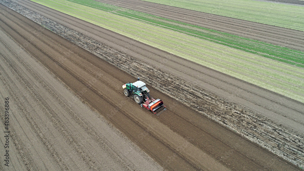 farmers sow winter wheat in fields, North China farmers sow winter wheat in fields, North China