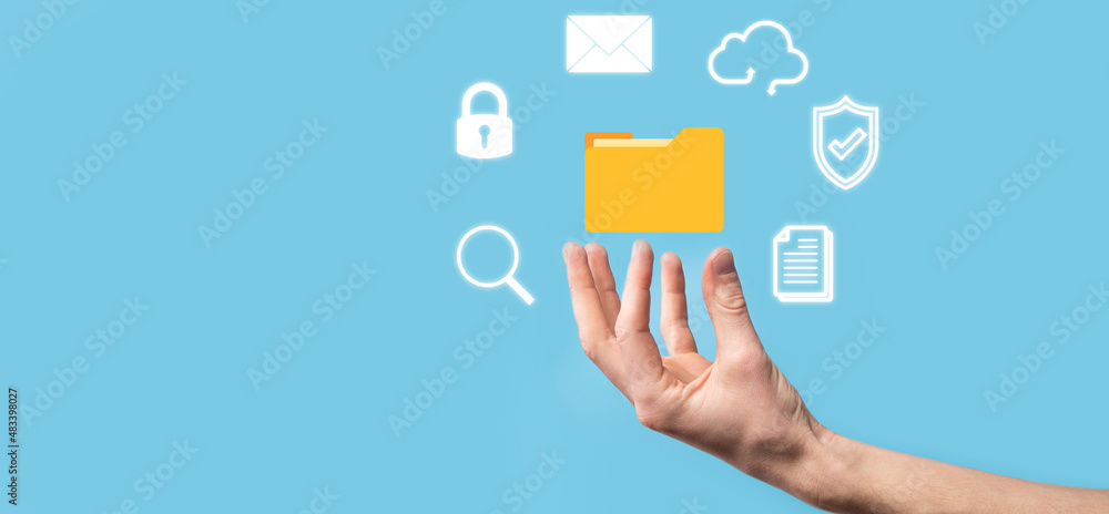 Document Management System DMS .Businessman hold folder and document icon.Software for archiving, searching and managing corporate files and information.Internet Technology Concept.Digital security Document Management System DMS .Businessman hold folder and document icon.Software for archiving, searching and managing corporate files and information.Internet Technology Concept.Digital security