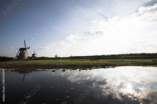 Horizontal picture of the famous Dutch windmills at Kinderdijk  a UNESCO world heritage site. On the photo are five of the 19 windmills at Kinderdijk  South Holland  the Netherlands  which are built