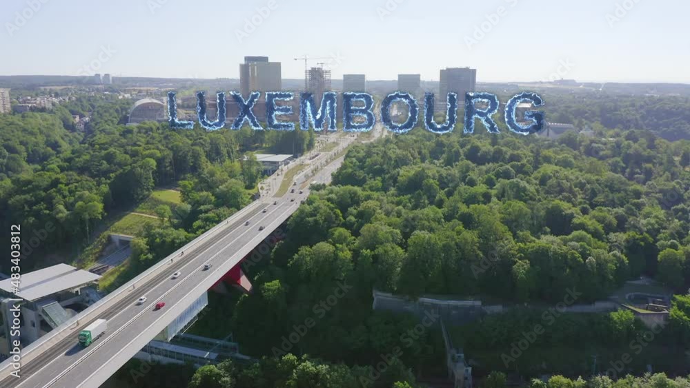 Inscription on video. Luxembourg, Avenue John F. Kennedy, An area with