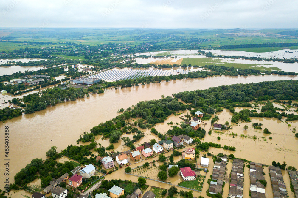 Aerial view of Dnister river with dirty water and flooded houses in Halych town, western Ukraine.