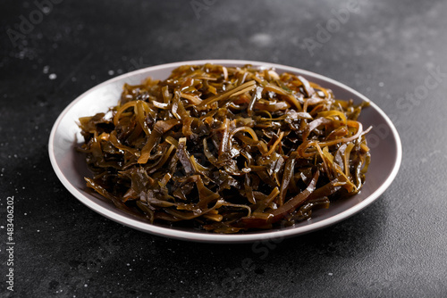 Fresh seaweed salad on plate. Healthy food