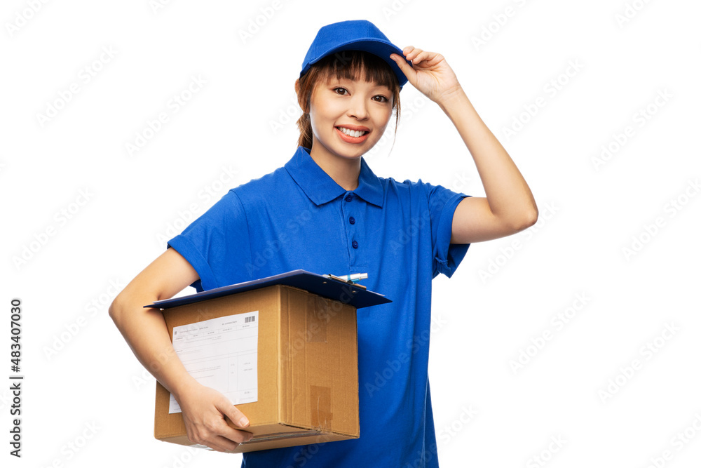 profession, job and people concept - happy smiling delivery woman in blue uniform holding parcel box over white background profession, job and people concept - happy smiling delivery woman in blue uniform holding parcel box over white background
