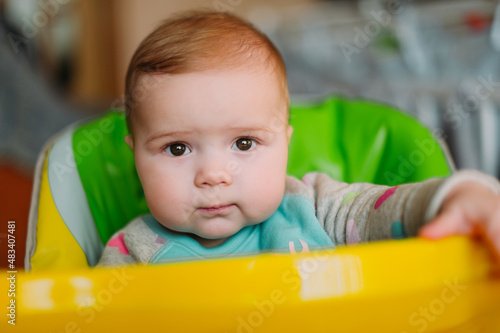 little cute baby toddler on carpet close up smiling adorable happy emotional playing at home