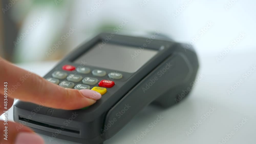 Woman paying with contactless credit card. Wireless money transaction. Wireless payment Woman paying with contactless credit card. Wireless money transaction. Wireless payment