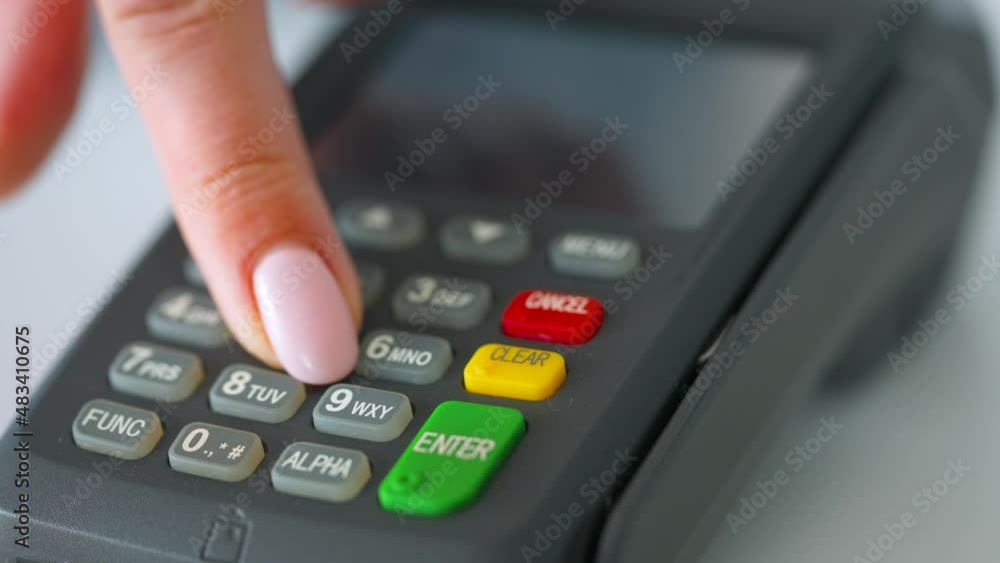 Woman paying with contactless credit card. Wireless money transaction. Wireless payment. Slow motion Woman paying with contactless credit card. Wireless money transaction. Wireless payment. Slow motion