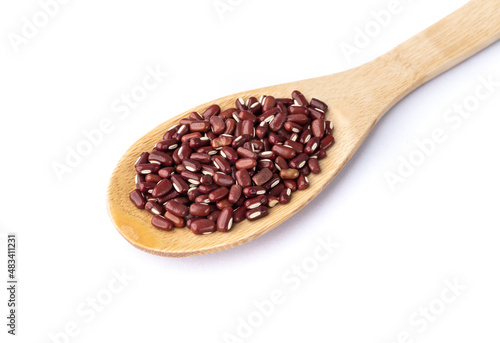 Azuki beans on a spoon isolated over white background