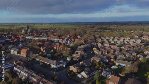 Drone above suburban houses in English market town countryside. Filmed East Yorkshire. England. UK  photo