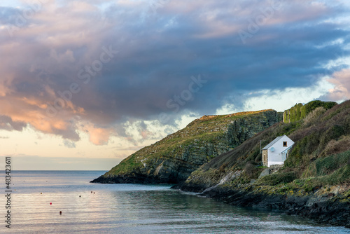 A small bay with sunset sky at Abercastle on the Welsh coast photo