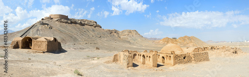 Ruins of ritual buildings in front of Dakhmeh Zoroastrian Tower of Silence, Yazd, Iran photo