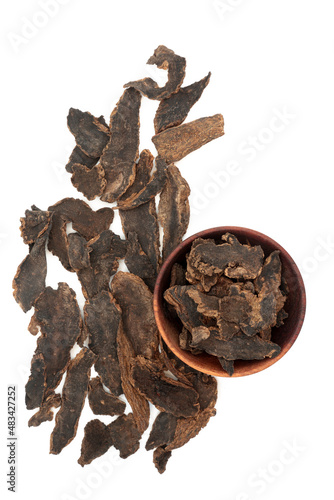 Scrophularia figwort root herb used in traditional Chinese herbal plant  medicine on white background. Used as heart tonic, is anti inflammatory, treats laryngitis, sore throats and fevers. Zuan shen. photo