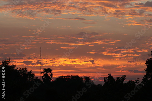 Orange light ,mist and silhouette in the early morning