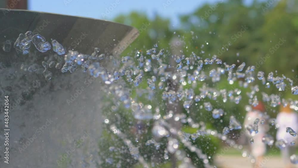 Water drops jump in the fountain in slow motion 180fps Water drops jump in the fountain in slow motion 180fps