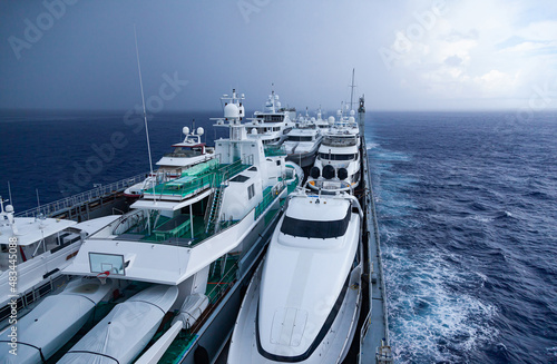 Transportation of yachts across the ocean.