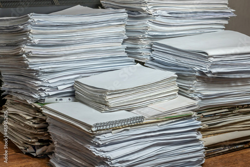 pile of paper documents in the office, paper trash, waste paper