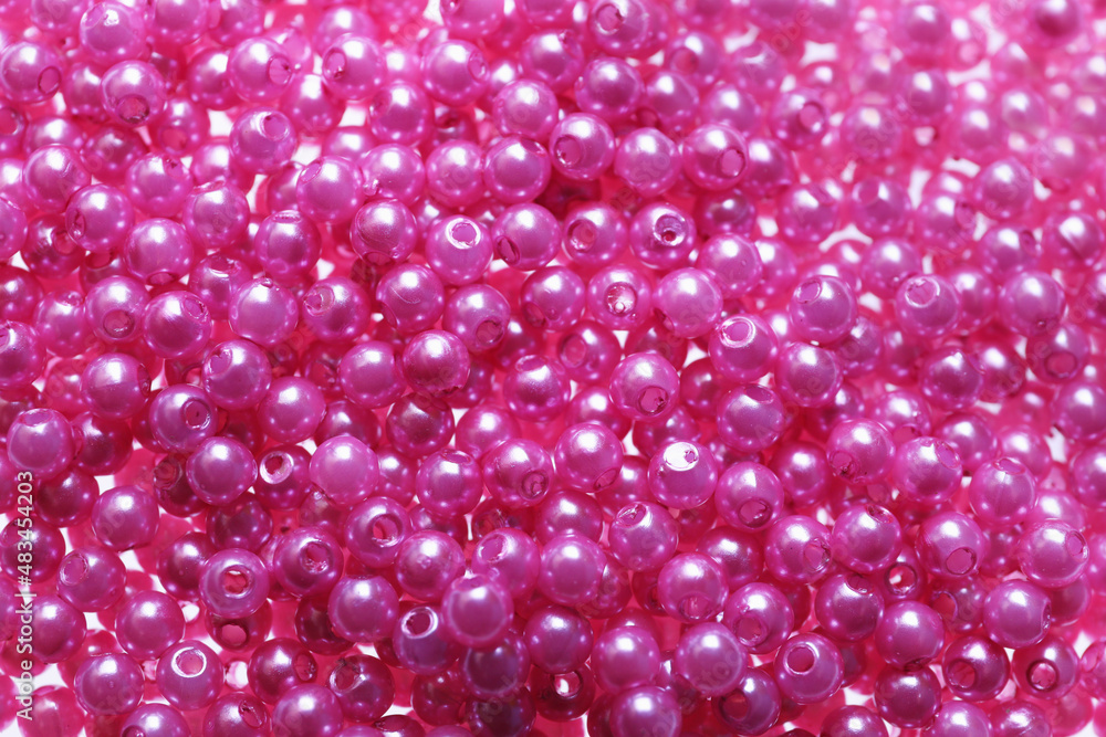 Pile of pink beads as background, closeup Pile of pink beads as background, closeup