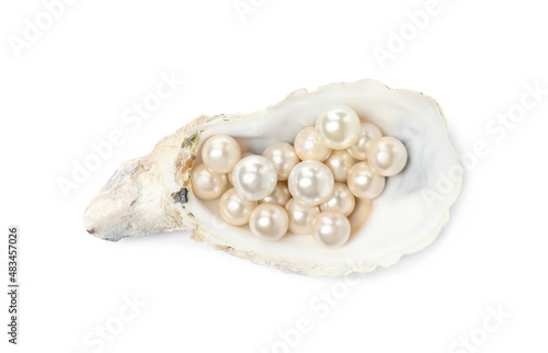 Oyster shell with pearls on white background, top view