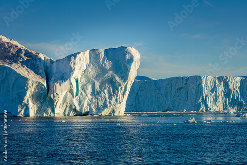 Wall of ice in the sea at the mouth of the Ilulissat icefjord, Greenland 