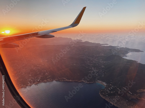 Sunset view of Ibiza from an airplane