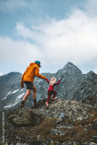 Father and daughter trail running in mountains family travel vacations hiking outdoor adventure hobby healthy lifestyle trip eco tourism