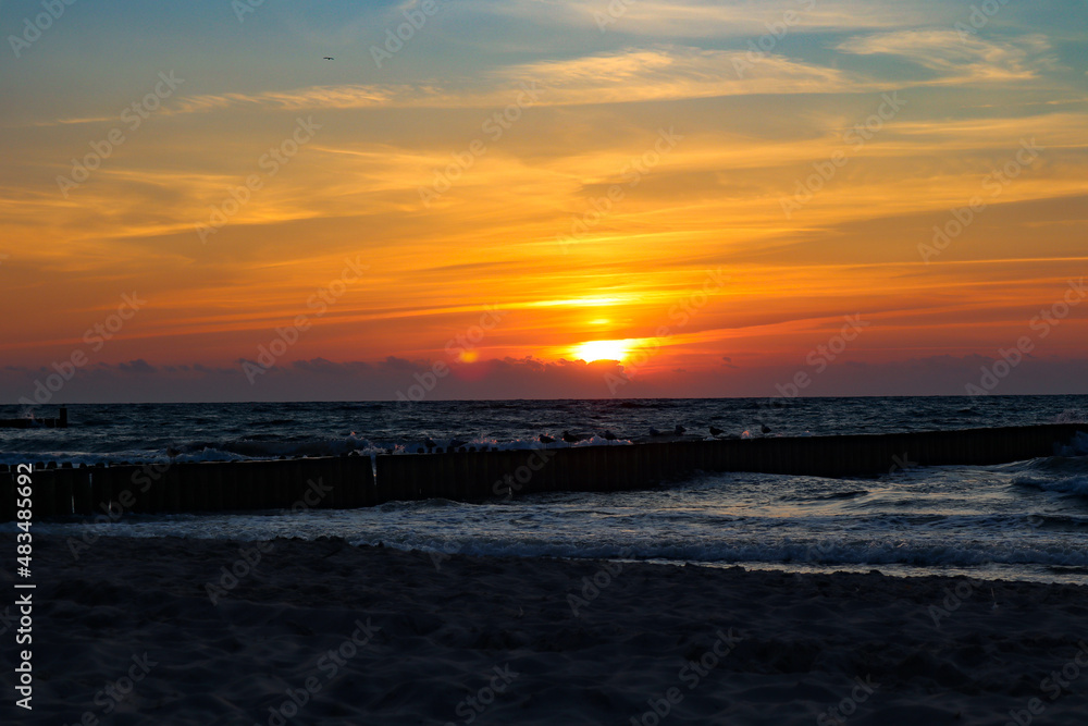 Naklejka premium sunset over the sea. Poland, baltic