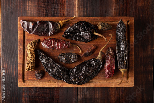 Variety of mexican dried chili. Chile Morita, Guajillo, sChipotle and Pasilla, This Mexican chili is the dried form chilaca chili and are used in a variety of Mexican preparations. photo