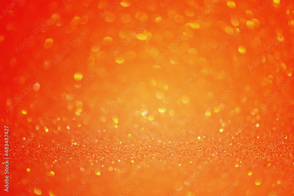 Abstract orange background. Blurred focus of glitter with radiance. Abstract orange background. Blurred focus of glitter with radiance.